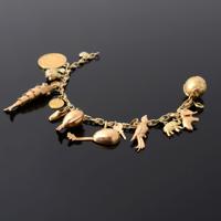 Gold Charm Bracelet - Sold for $2,688 on 05-24-2025 (Lot 298).jpg